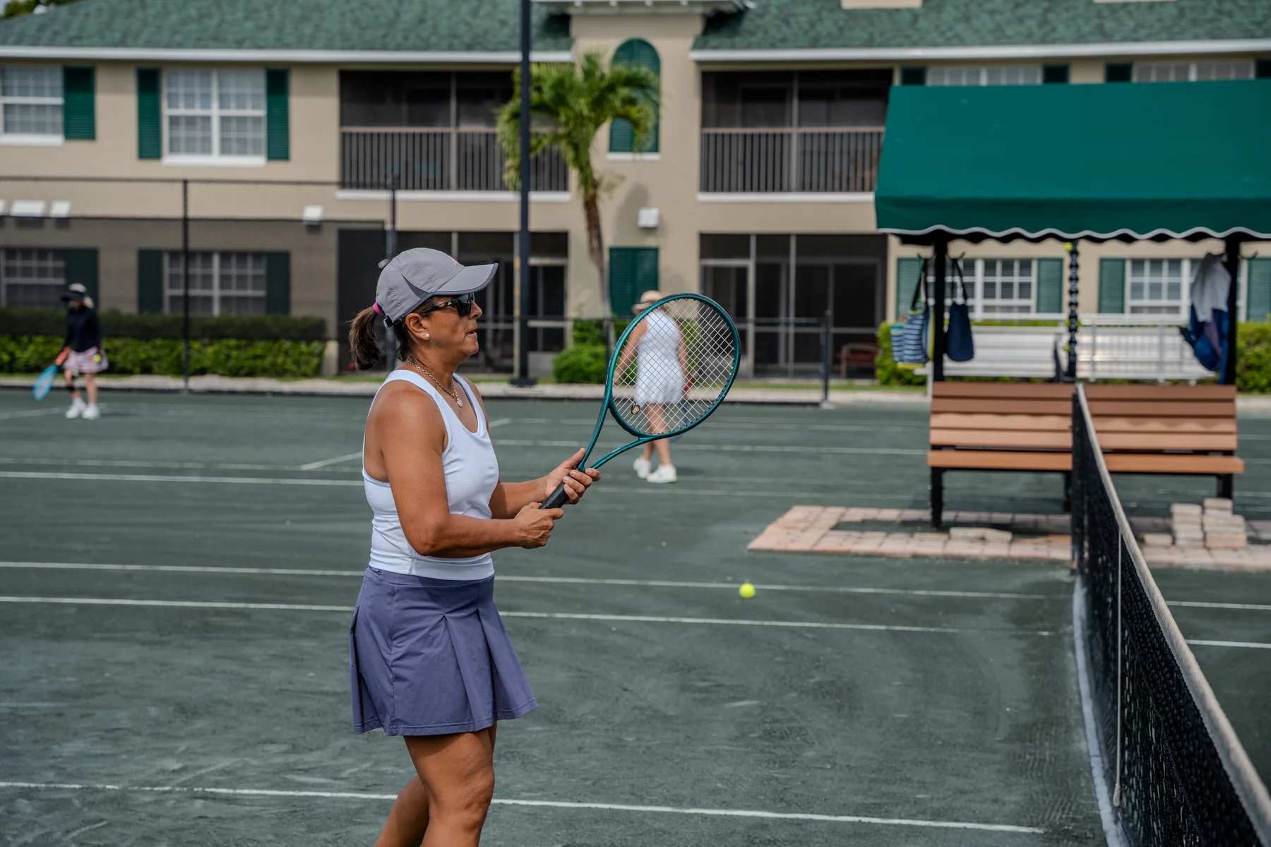 Boulevard members playing tennis